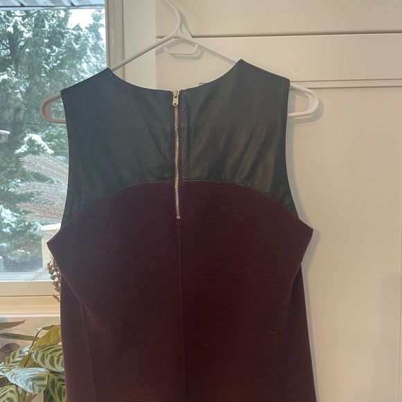 Sleeveless mixed material Club Monaco top. Black leather detail. - Picture 2 of 2